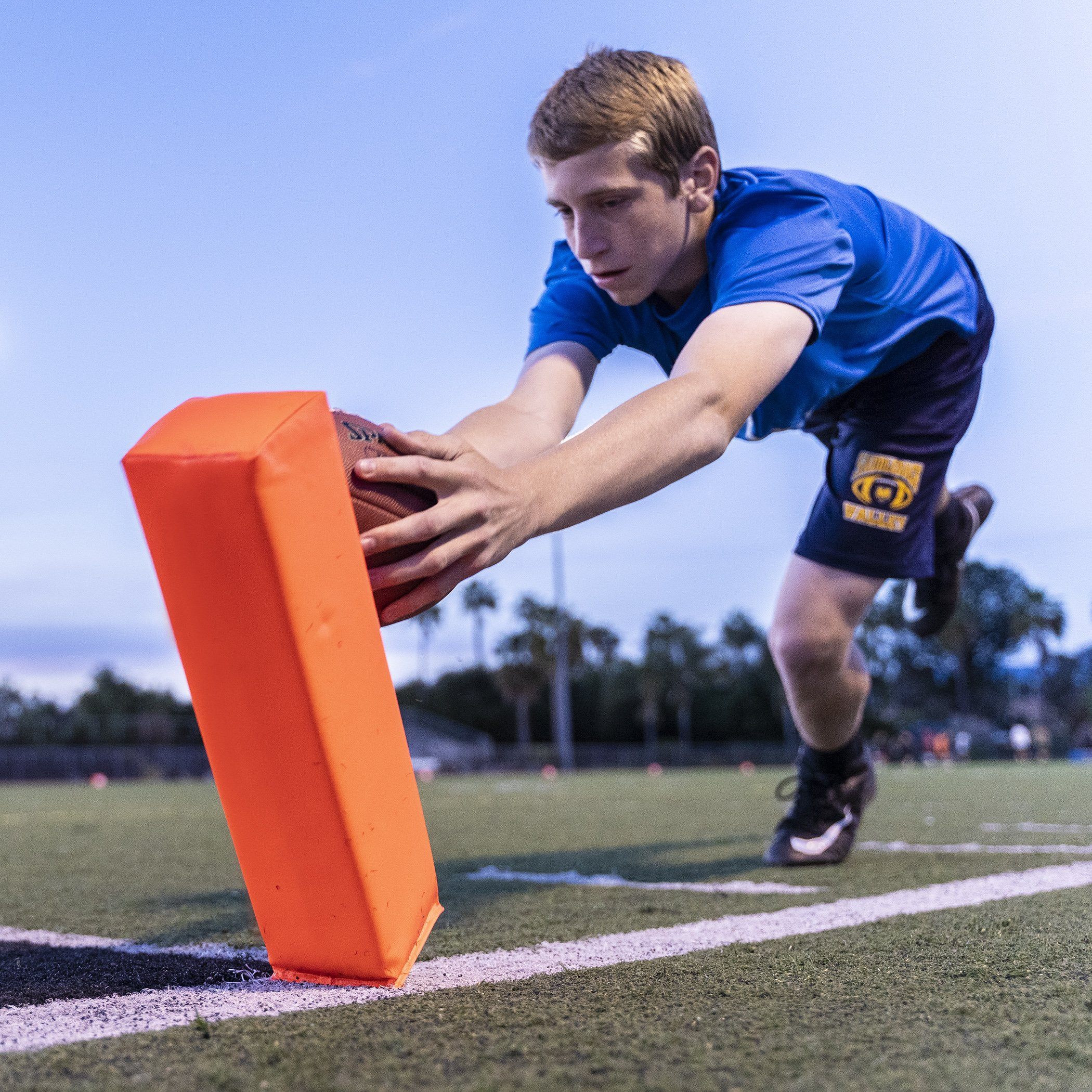 a young man is reaching for a frc