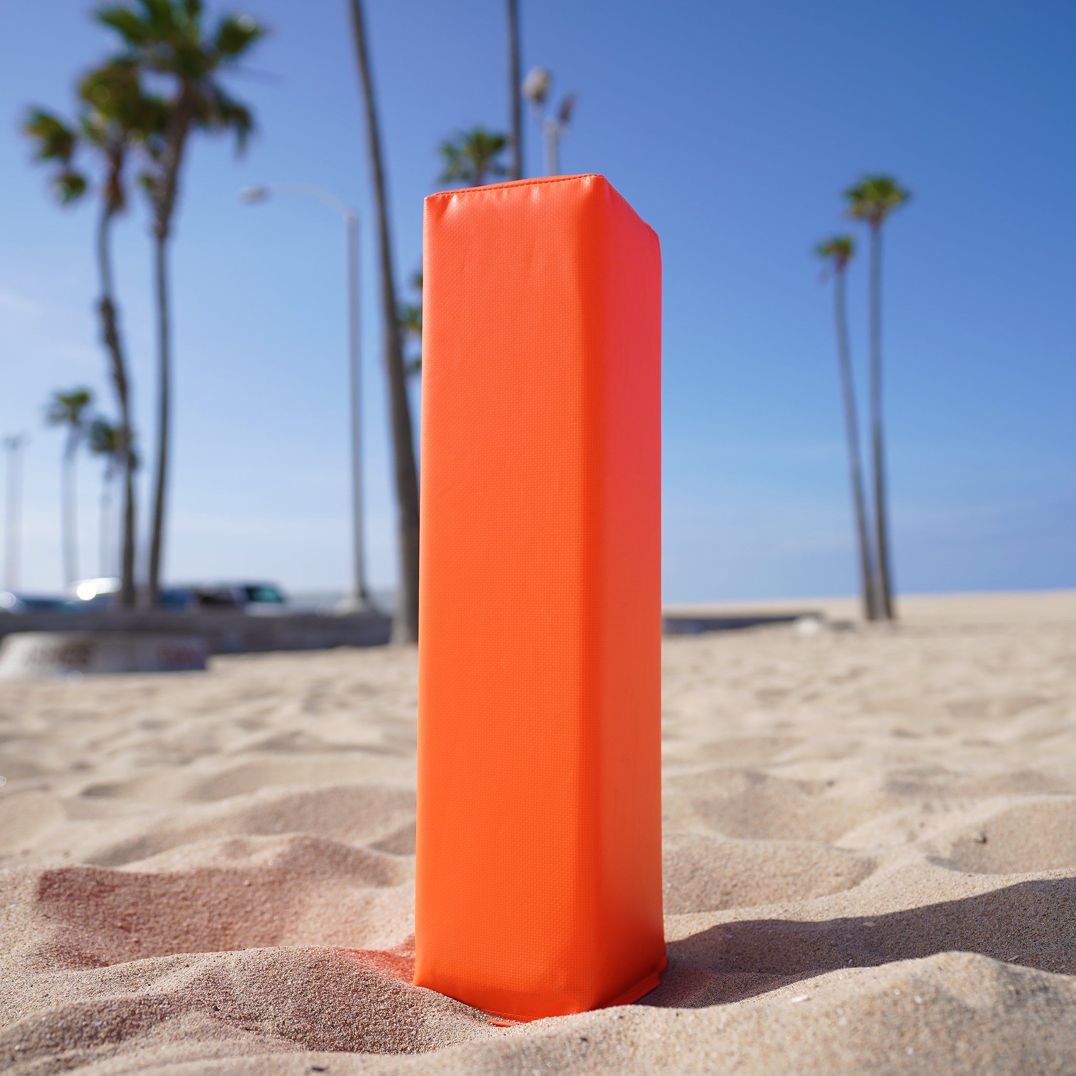 a orange object on the beach