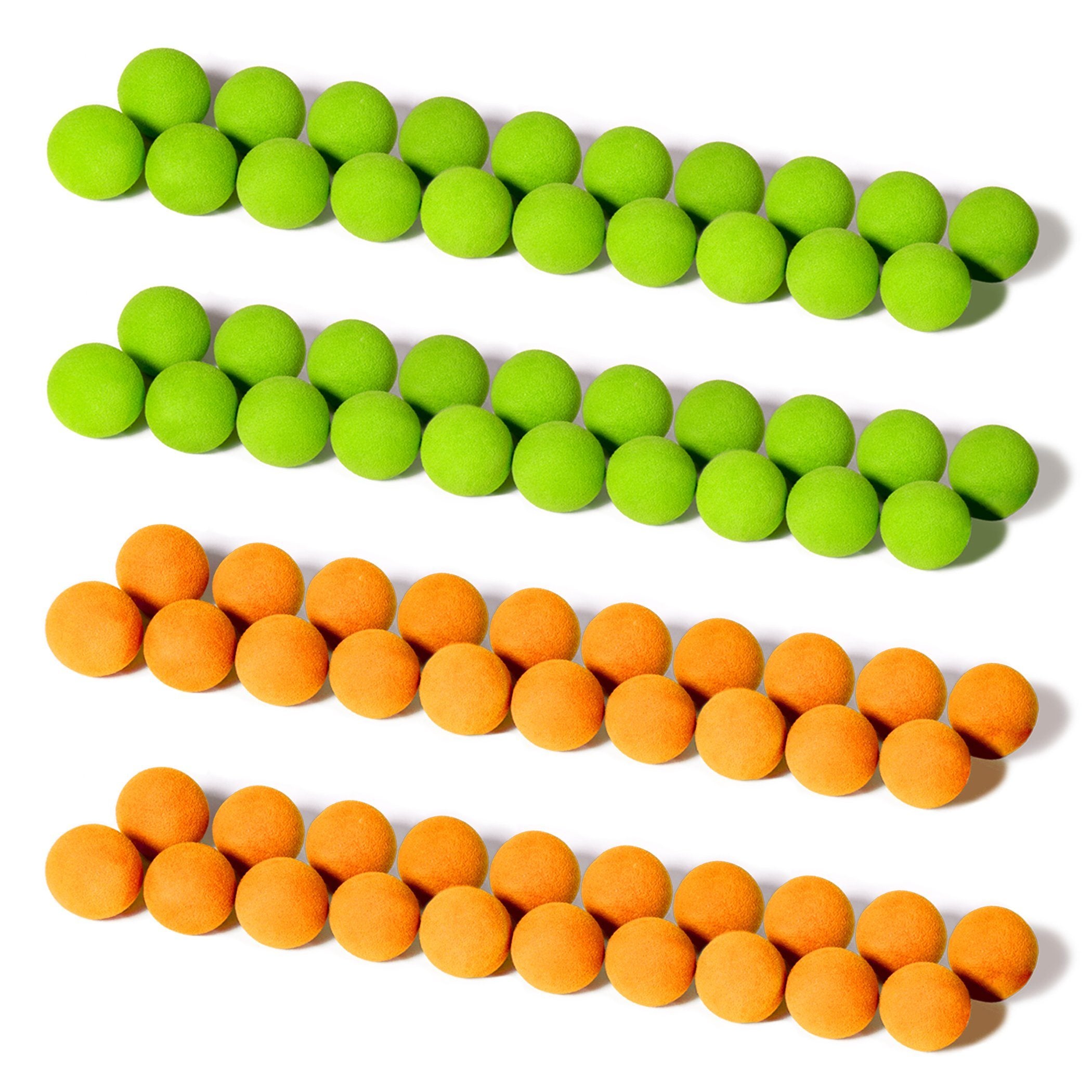 a bunch of orange and green candy balls