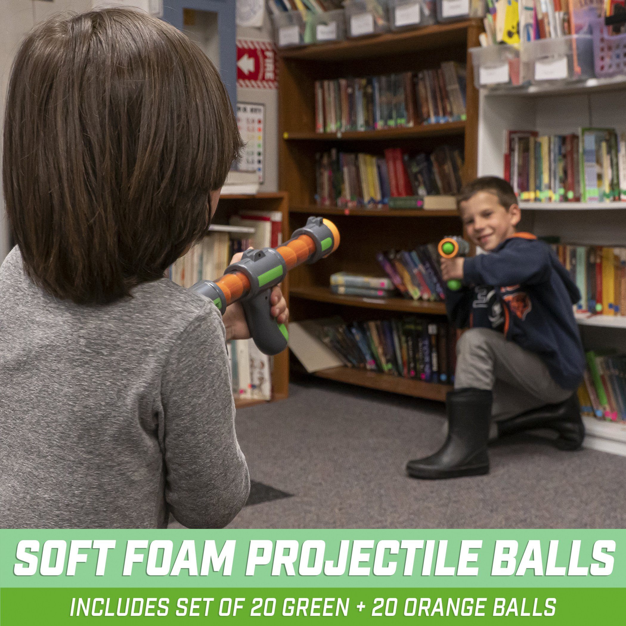 a young boy playing with a toy in a library