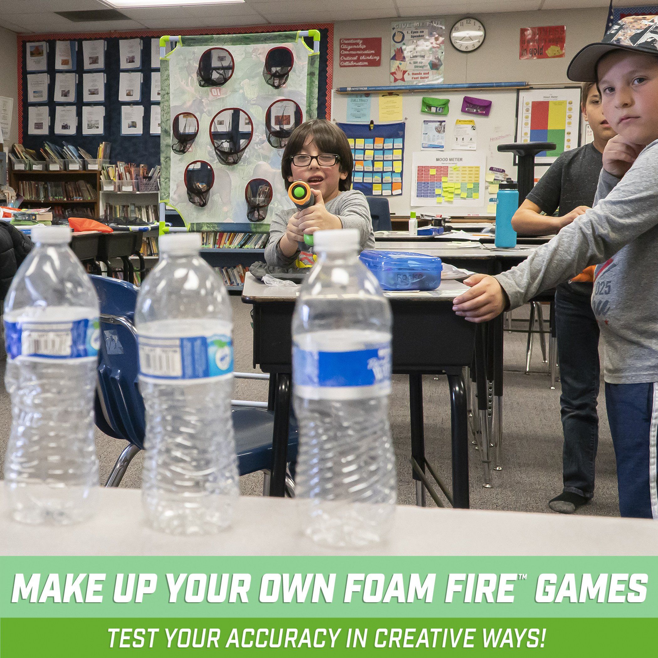 a group of kids sitting at a table with water bottles