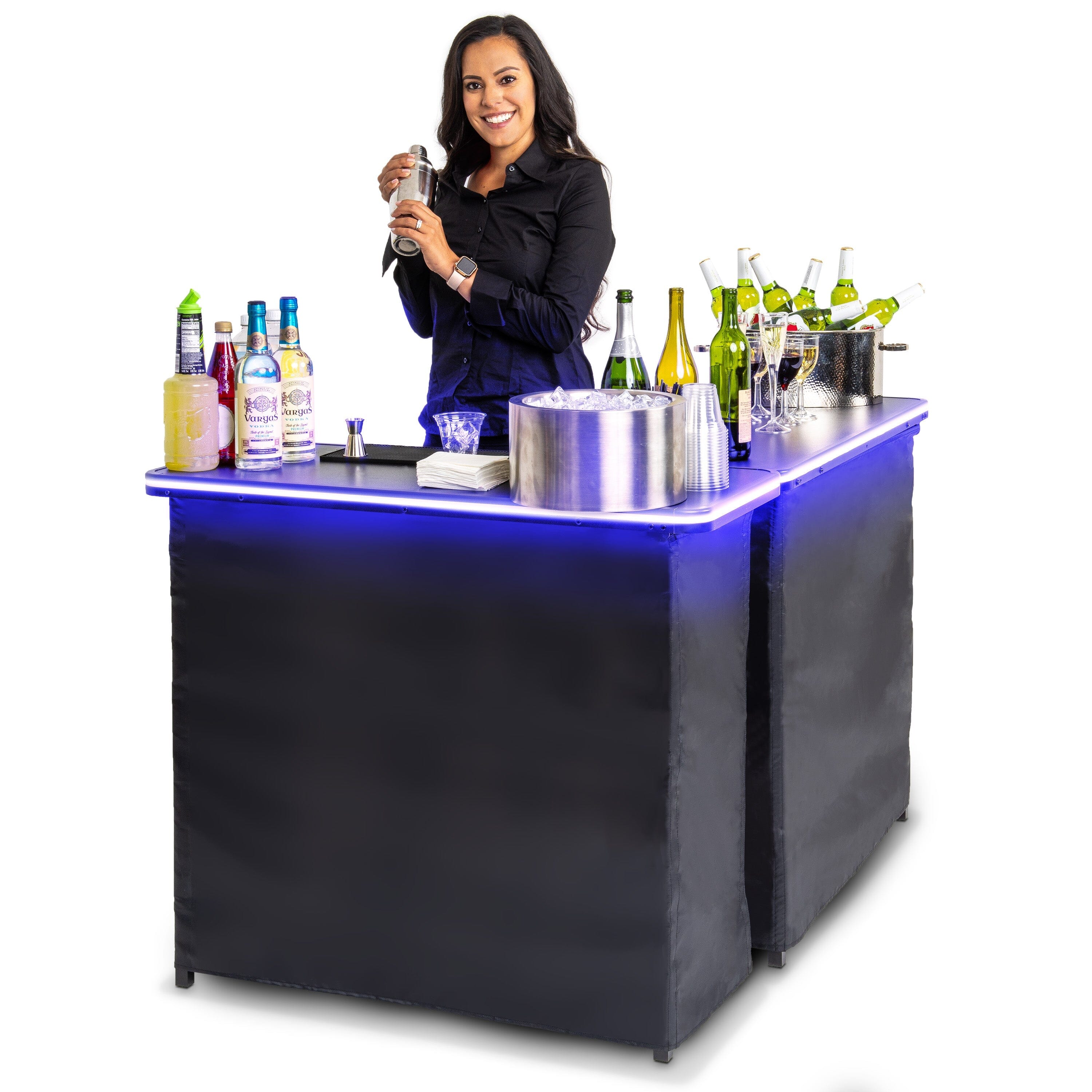 a woman standing behind a bar with bottles of alcohol