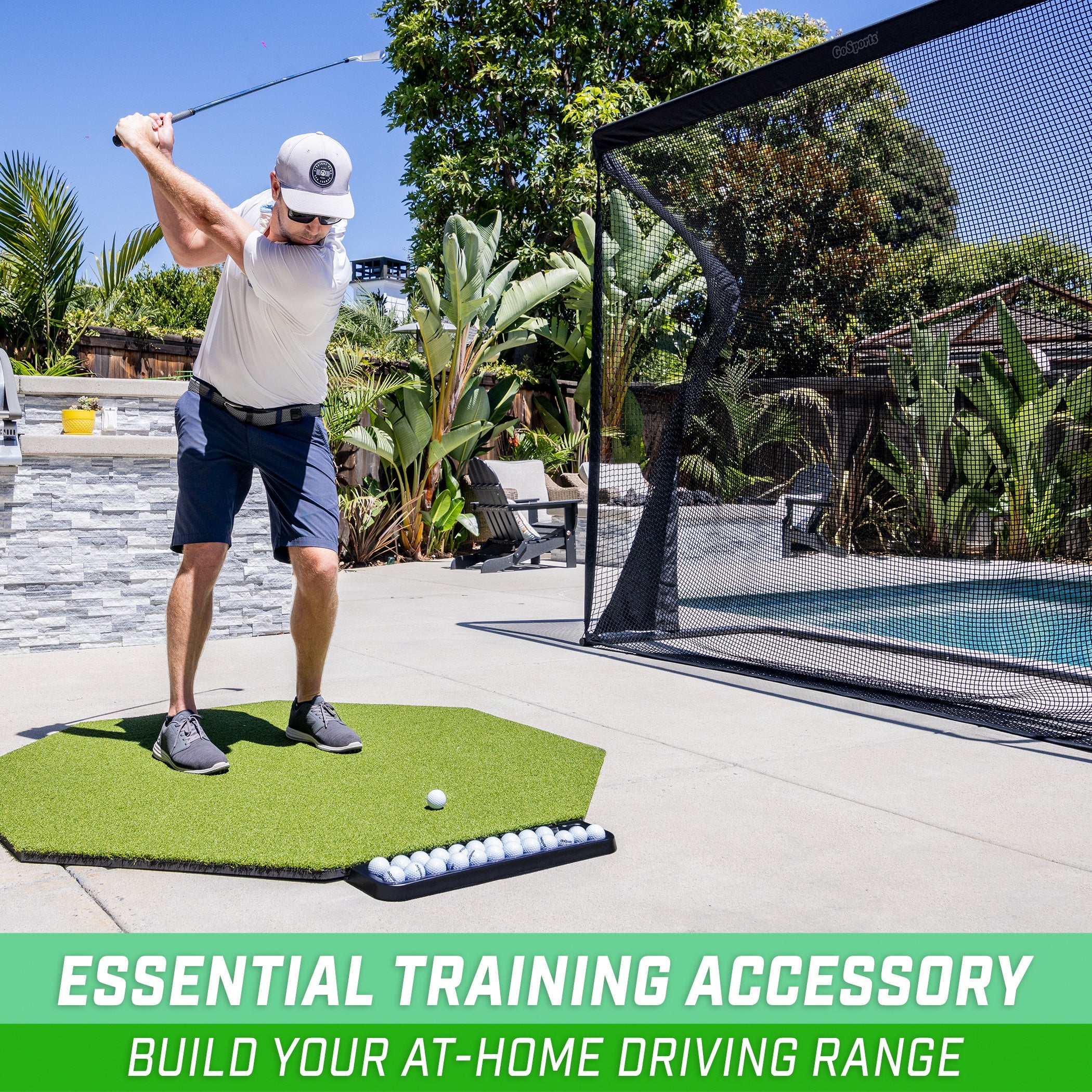 a man swinging a golf club ball on a golf course