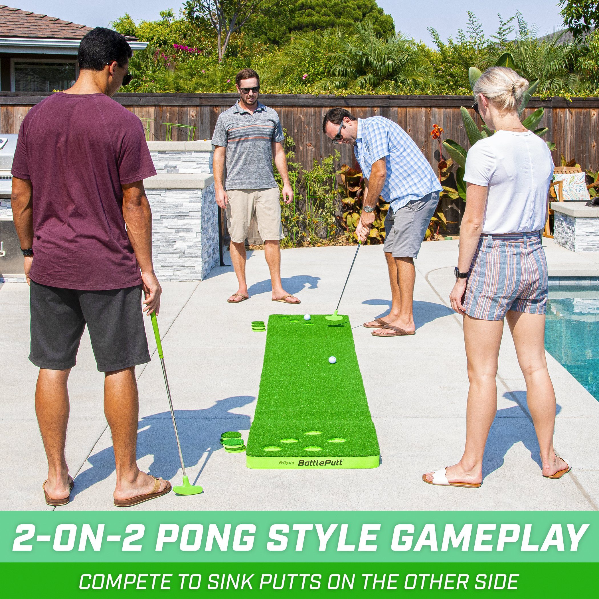 a group of people playing golf in a backyard