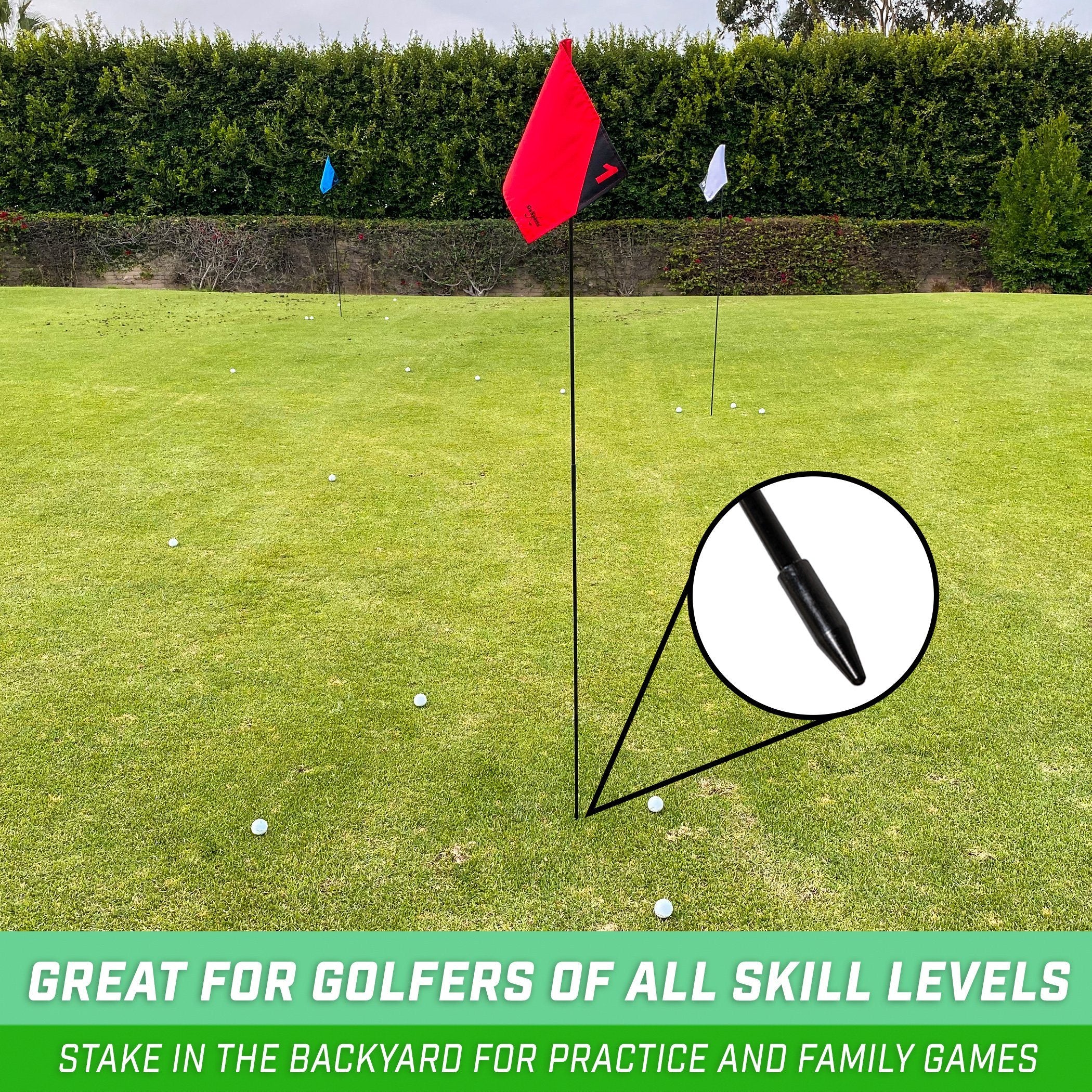 a golf ball and a golf tee on a green lawn