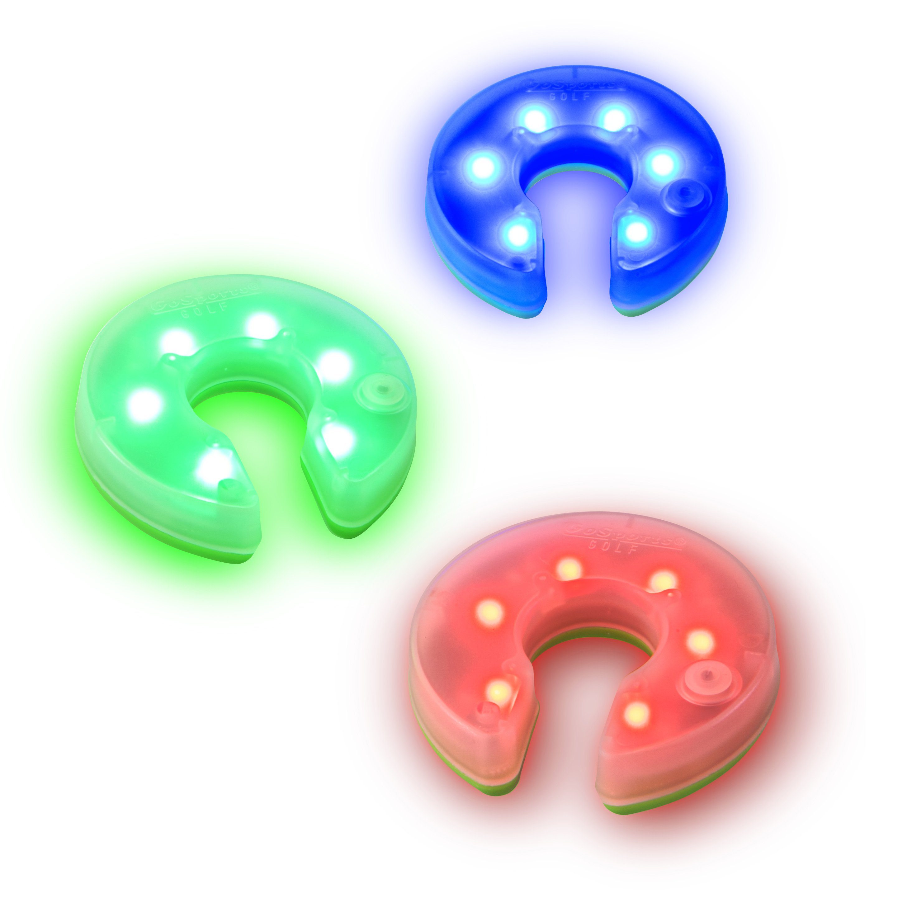 three different colored lights on a white background