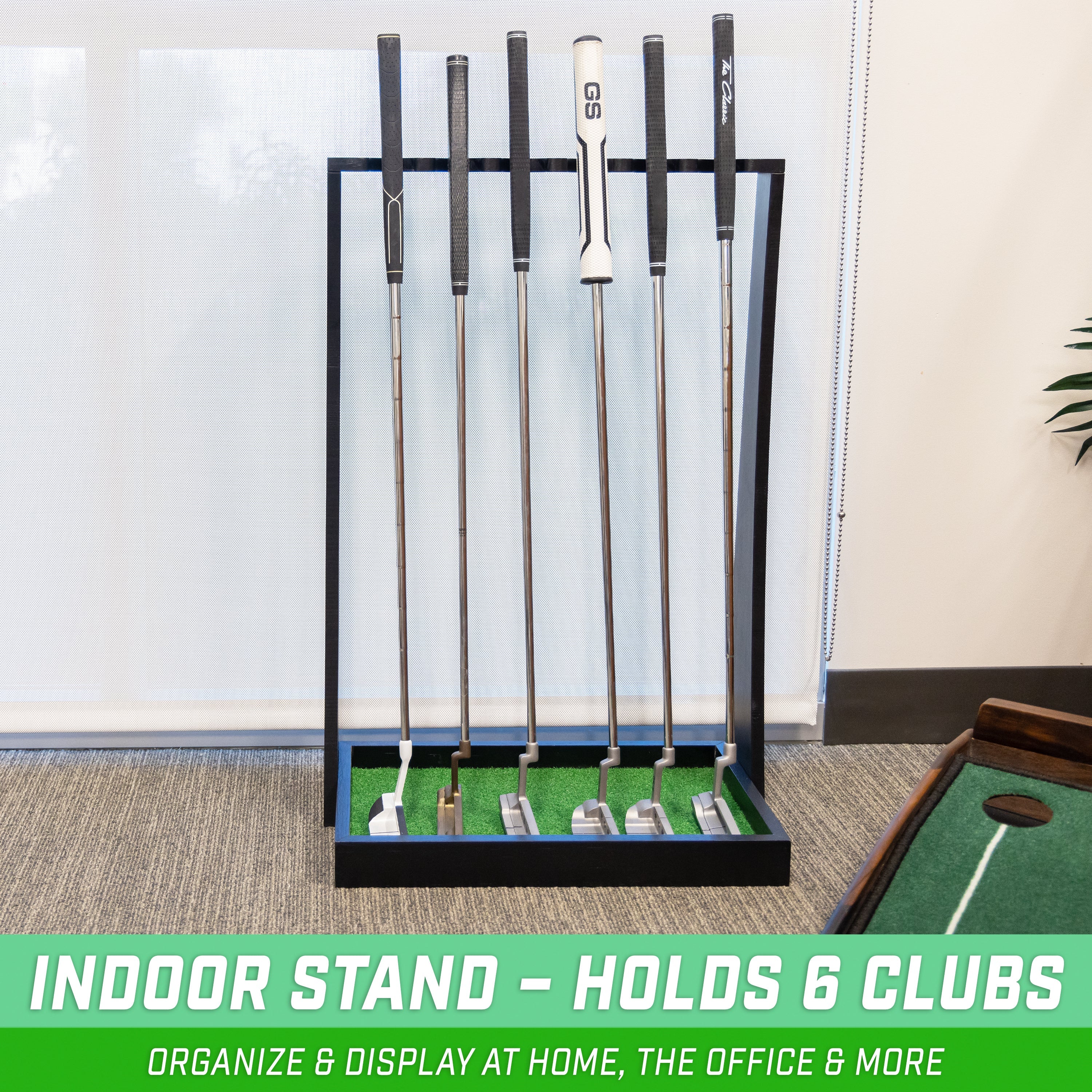 a golf set up with a golf ball and a putter