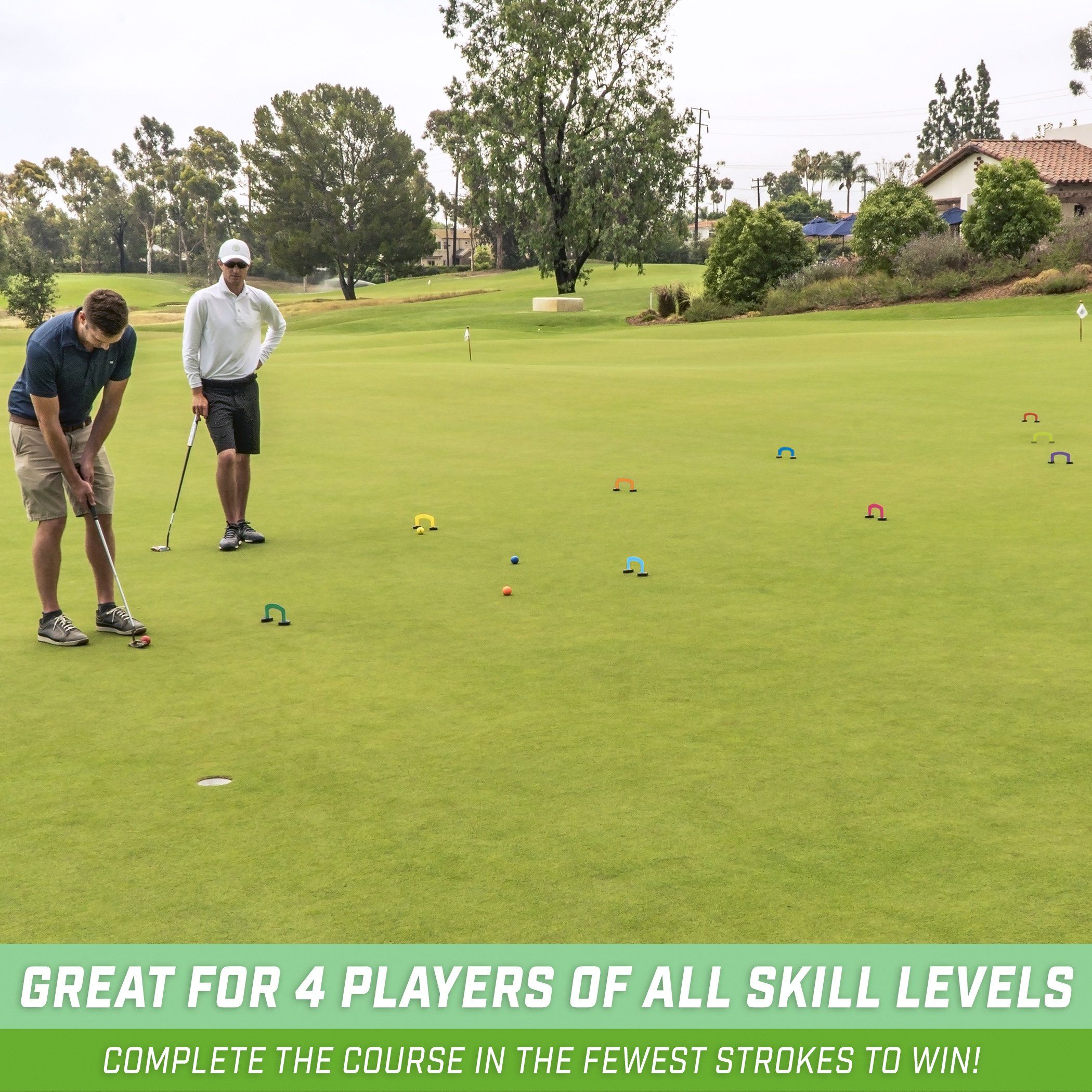 two men playing golf on a green field