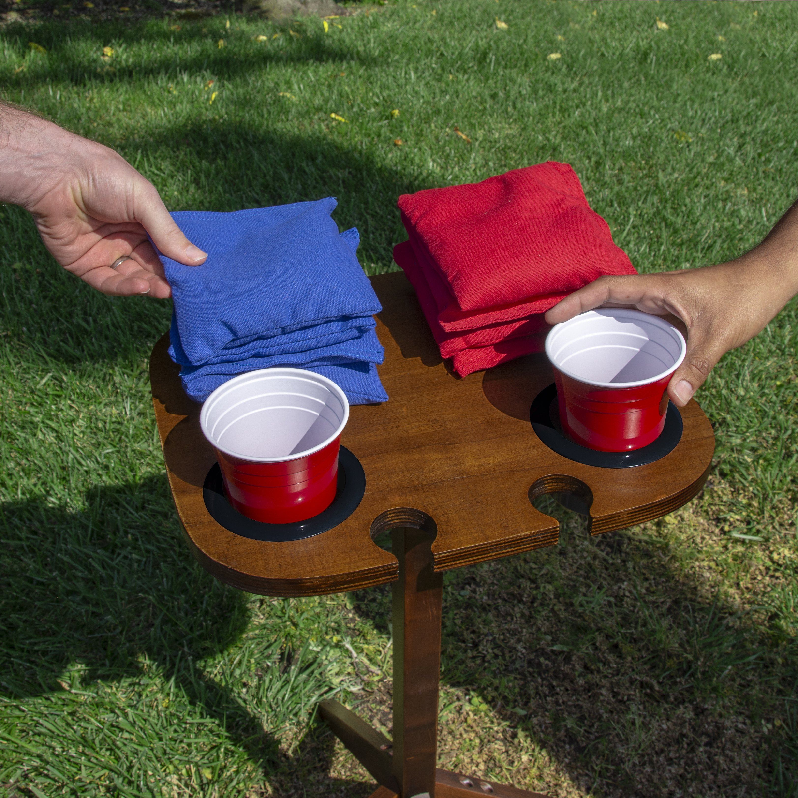 a person holding a cup and a napkin