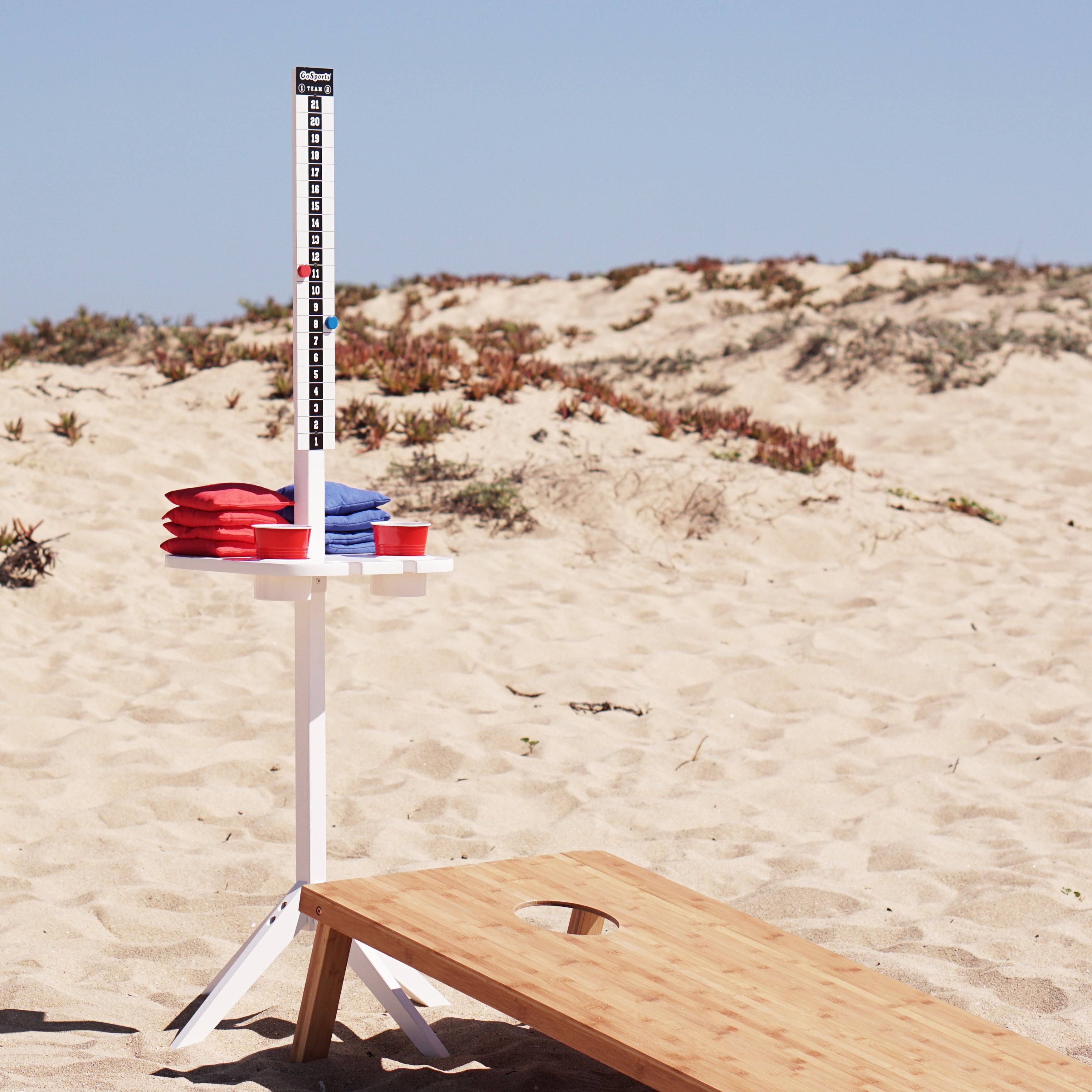 a wooden bench on the beach