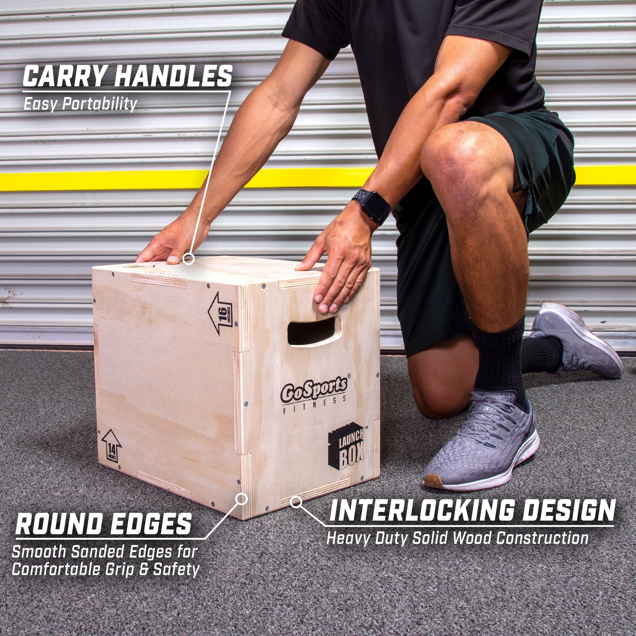 a man kneeling down to put a box