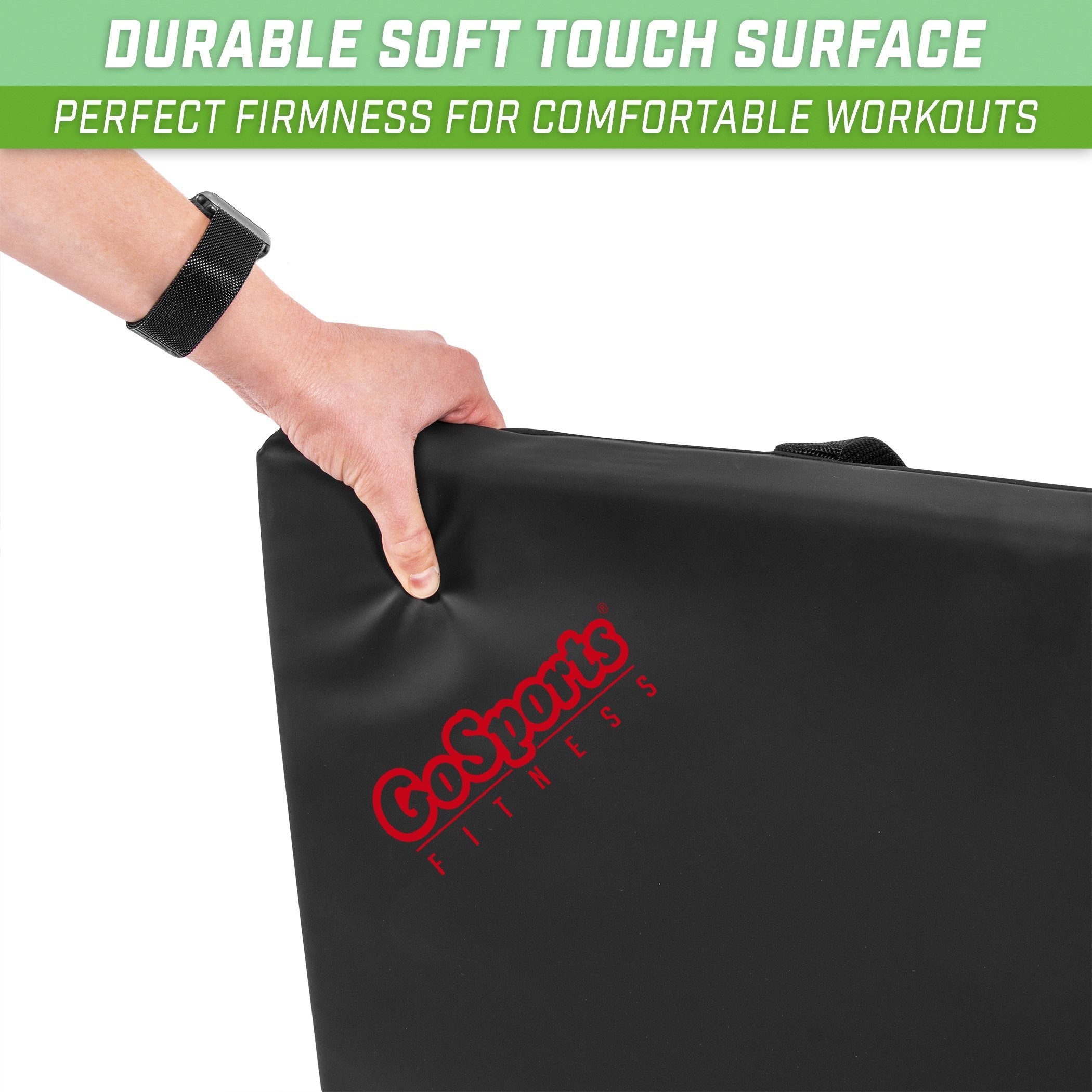a hand holding a black bag with the word, ' durable soft surface '