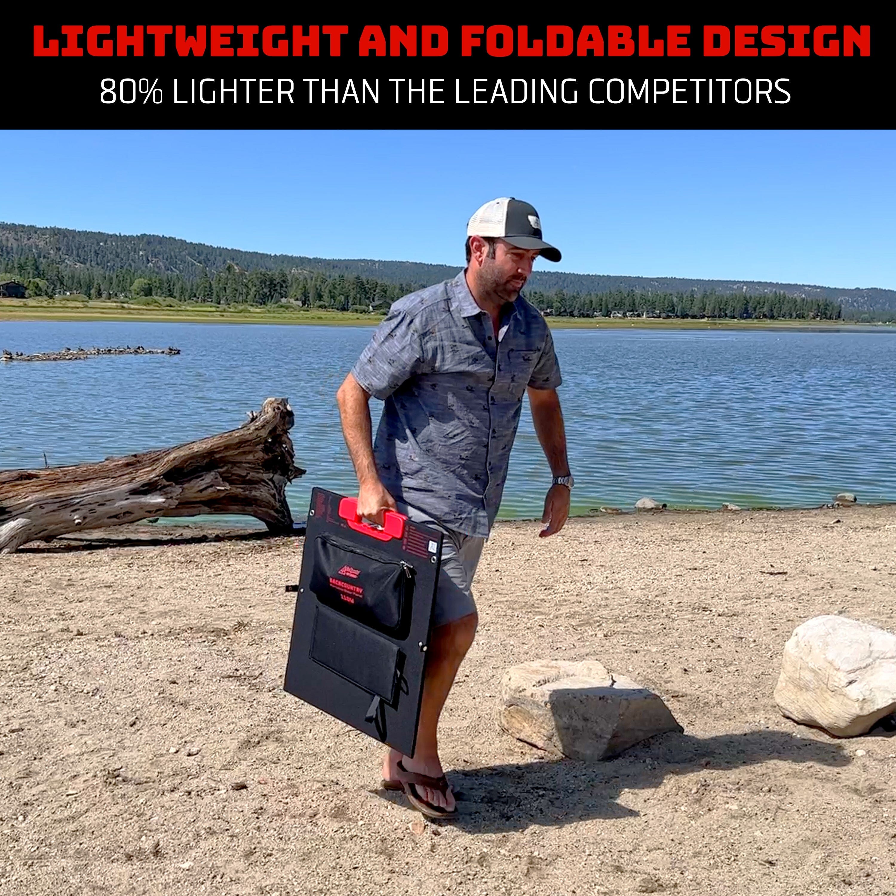 a man carrying solar panel on a beach