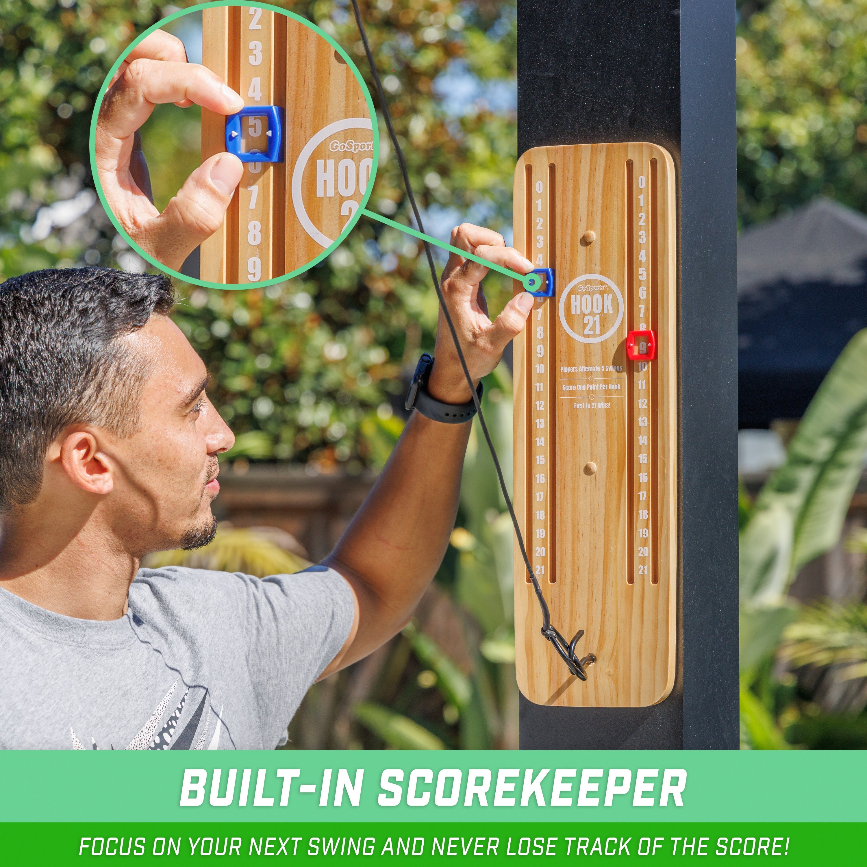 a man is holding a pair of scissors