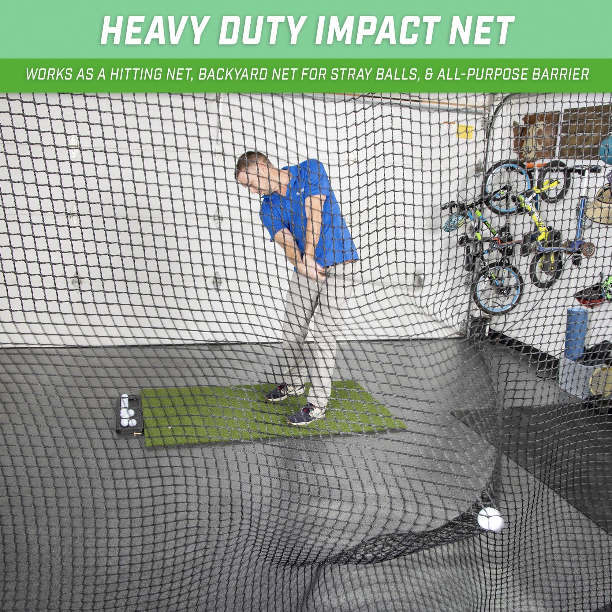 a man is playing golf in a net