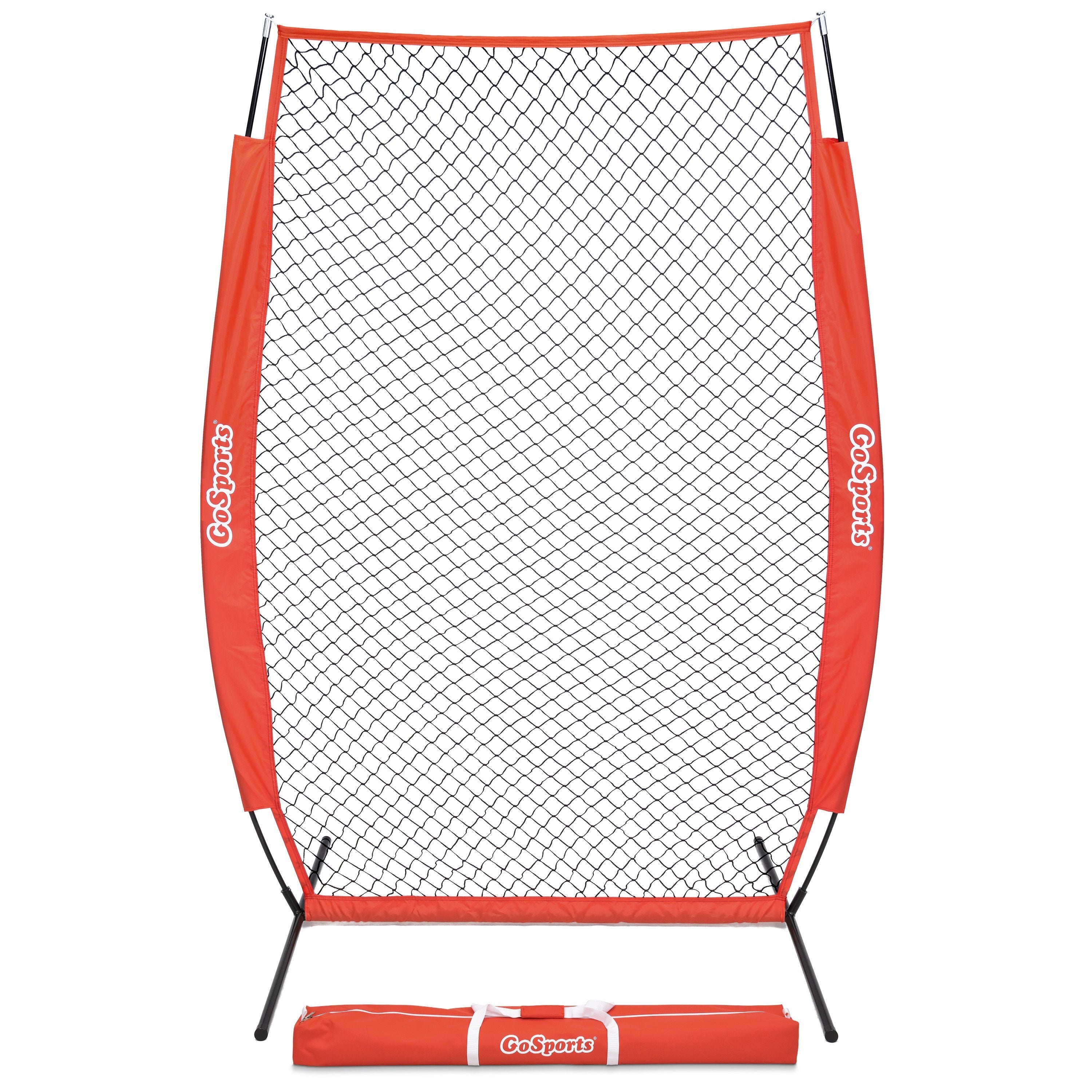 a red soccer goal with a net and a white ball