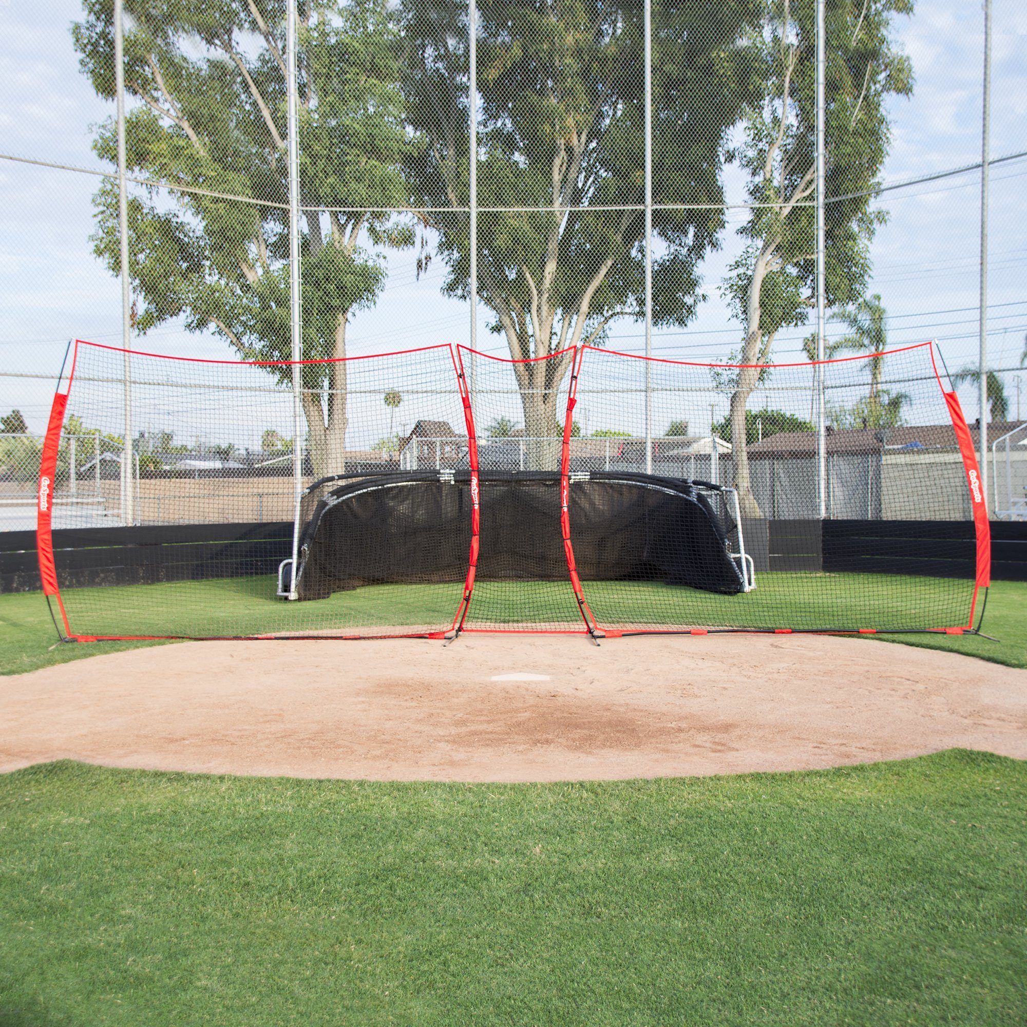 a baseball field with a baseball and a batting area