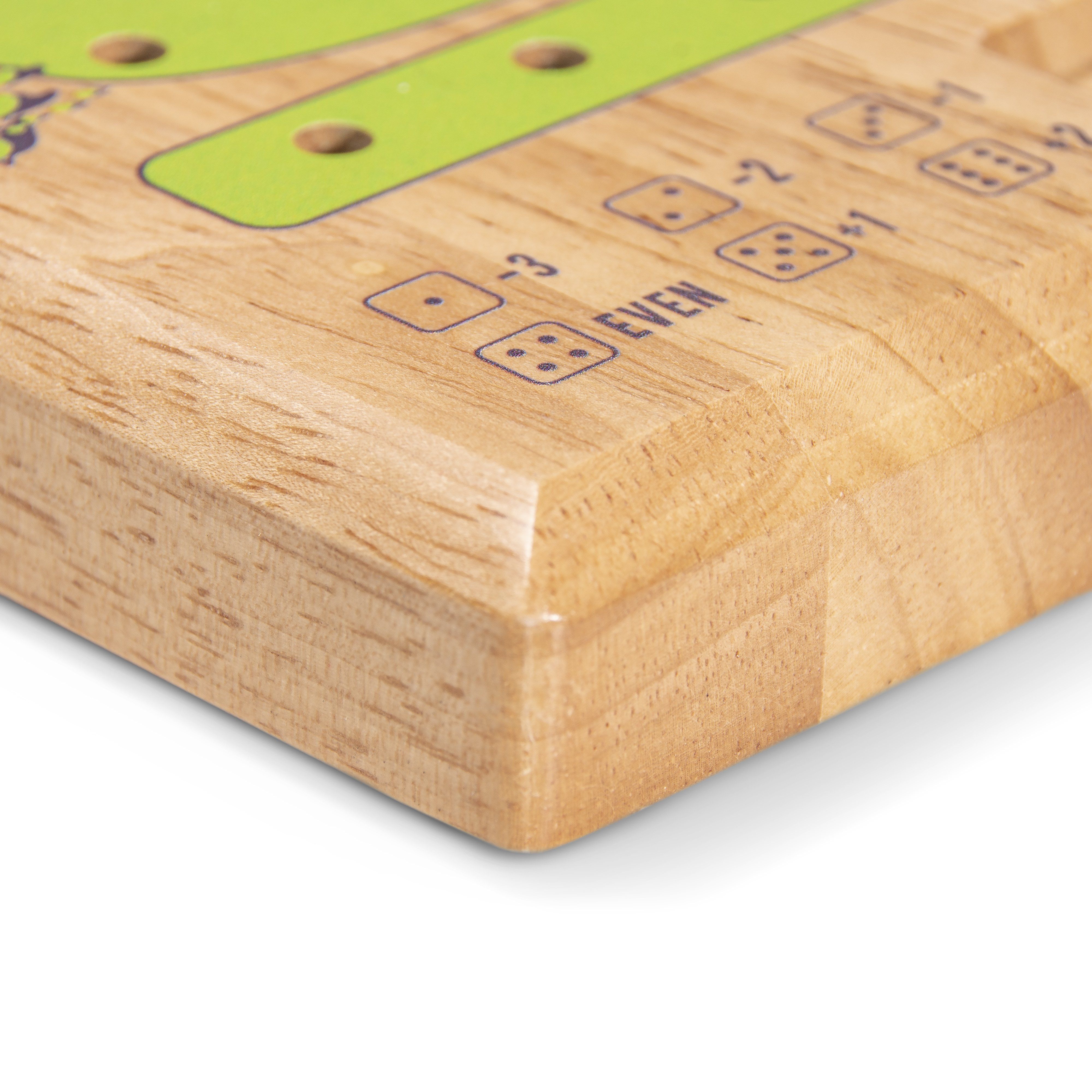 a wooden board with a green and blue design