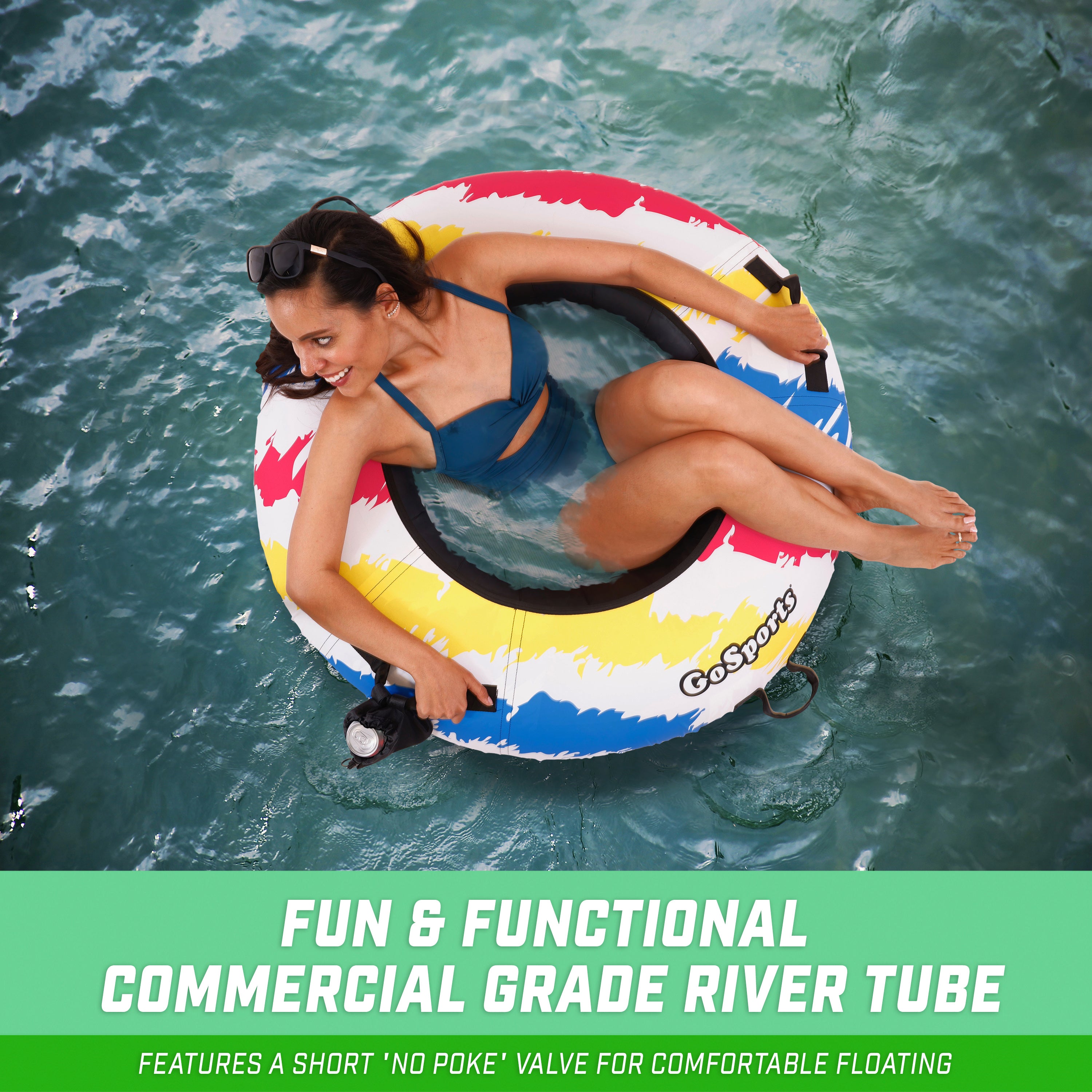 a woman in a swimsuit floating in a pool of water on a inflatable