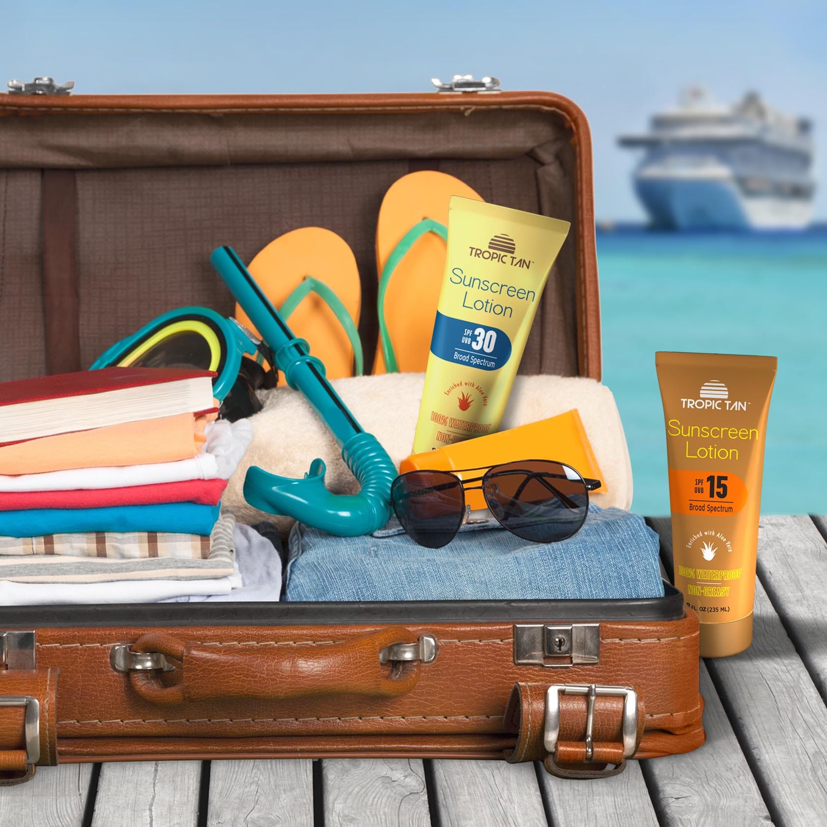 a suitcase filled with items on a wooden table