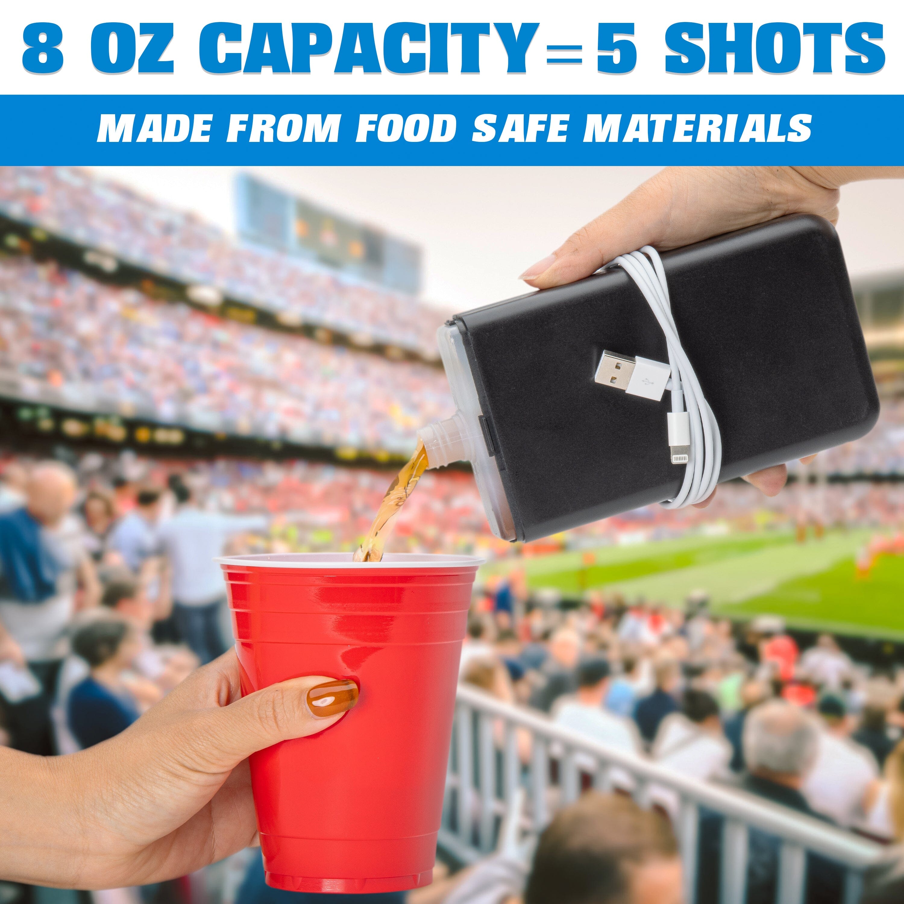 a hand holding a red cup with a straw in it