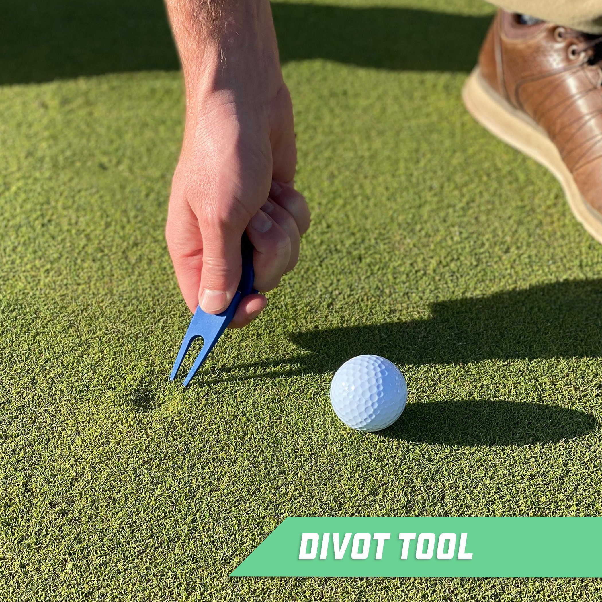 a man putting a golf ball on the green