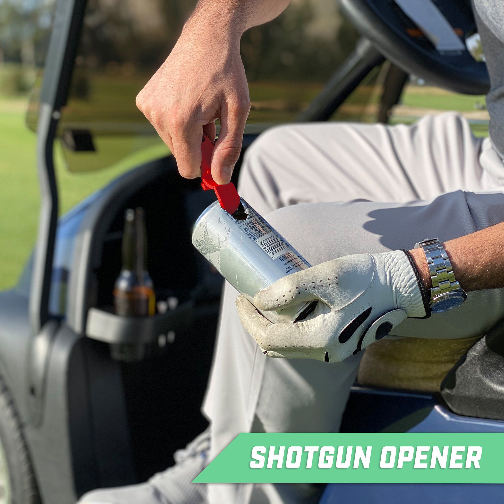 a man is putting a bottle of beer into a golf ball