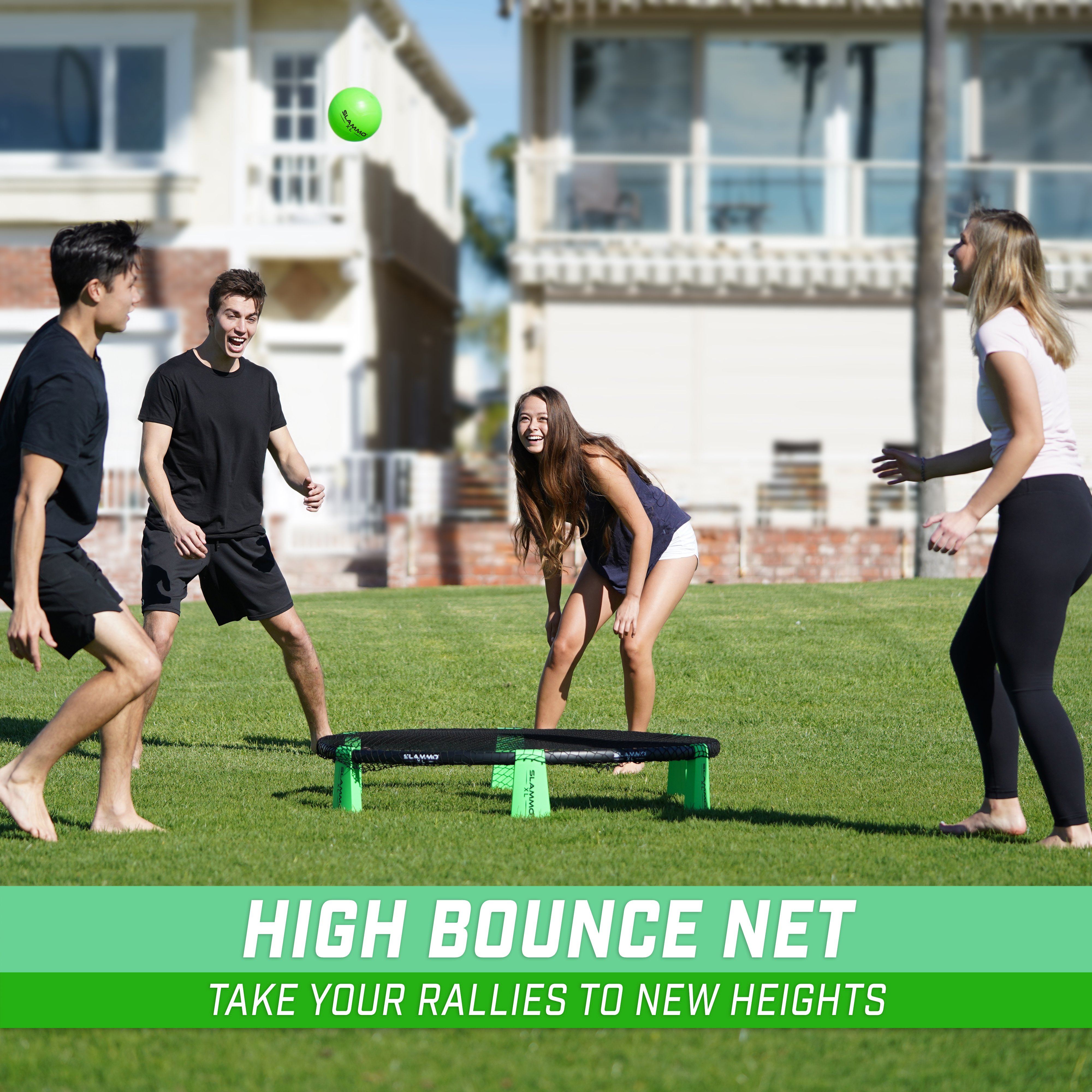 group of people playing ball at the park