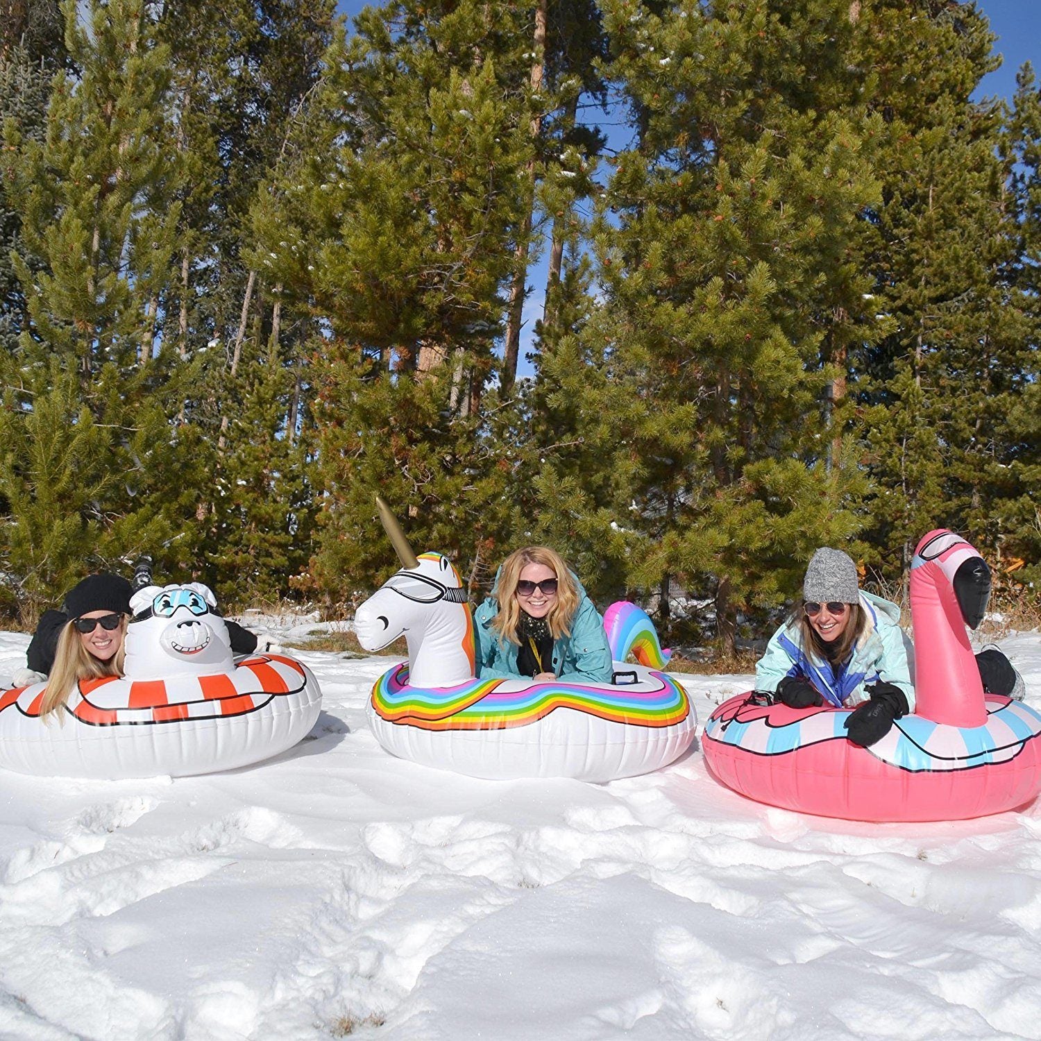 three girls in inflatables