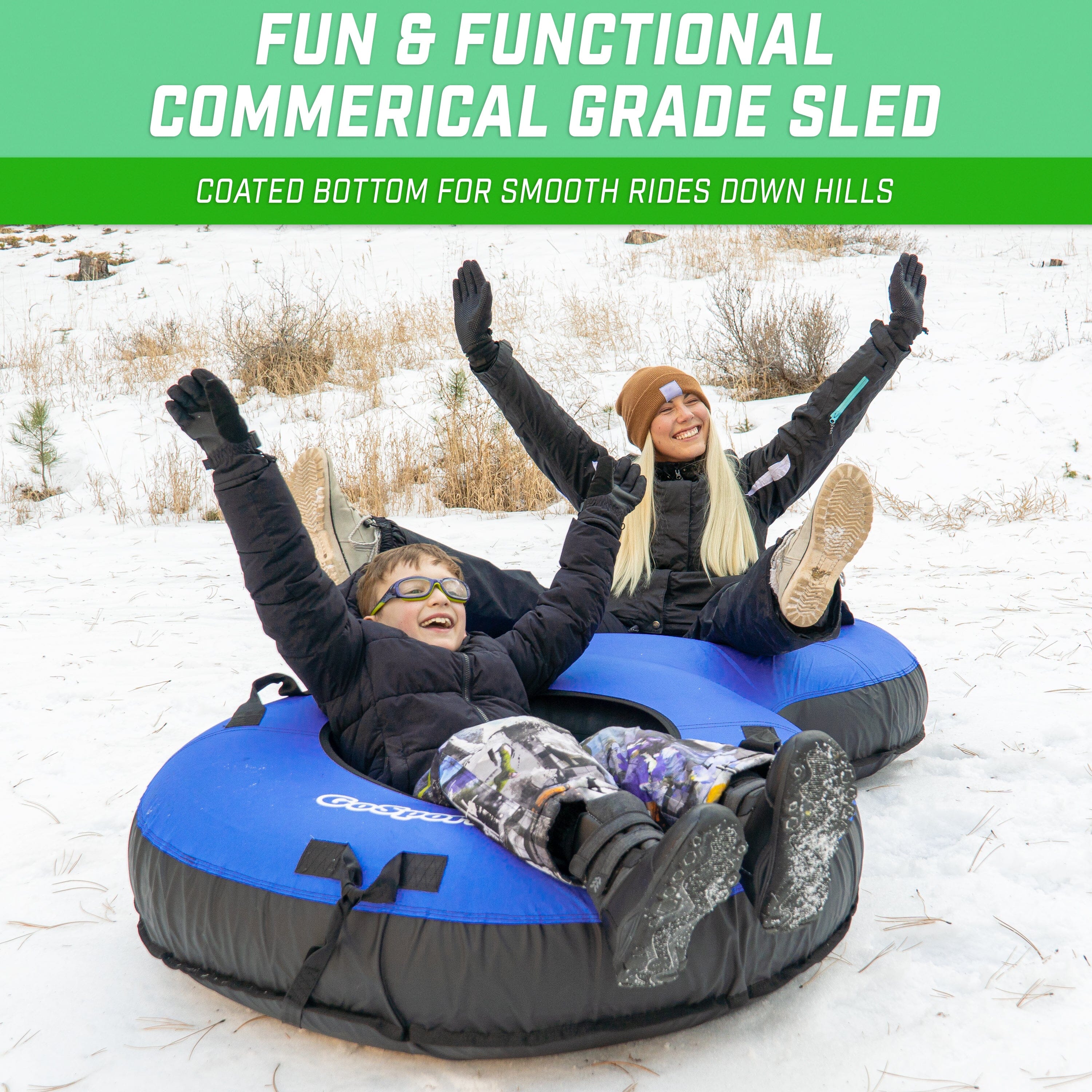 child and woman on top of a double seated inflatable snow tube