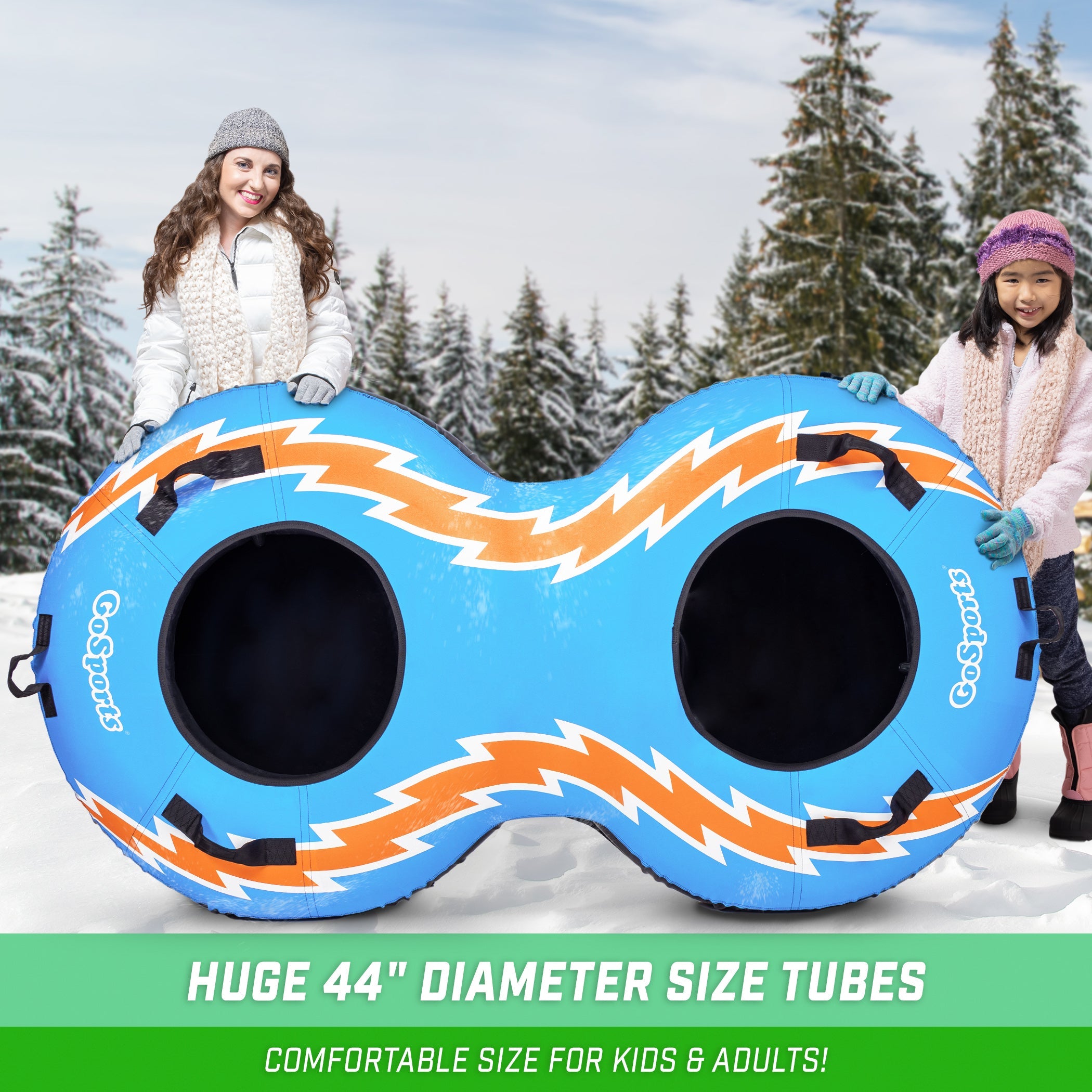 woman and child holding an inflatable double snow tube