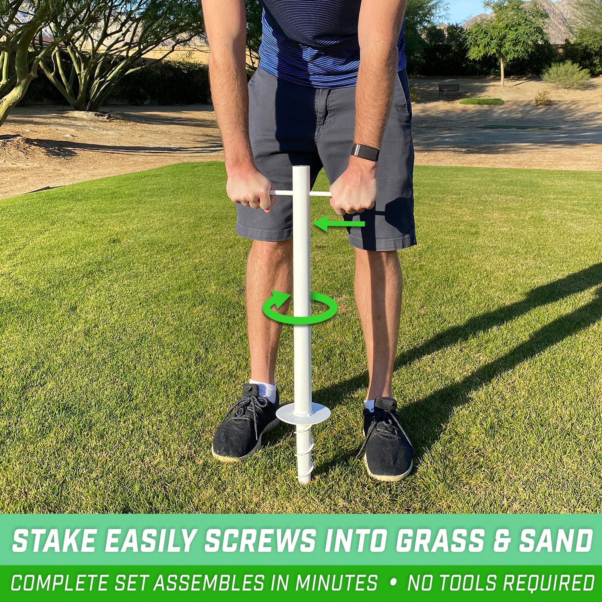 a man using a golf putter to put the ball