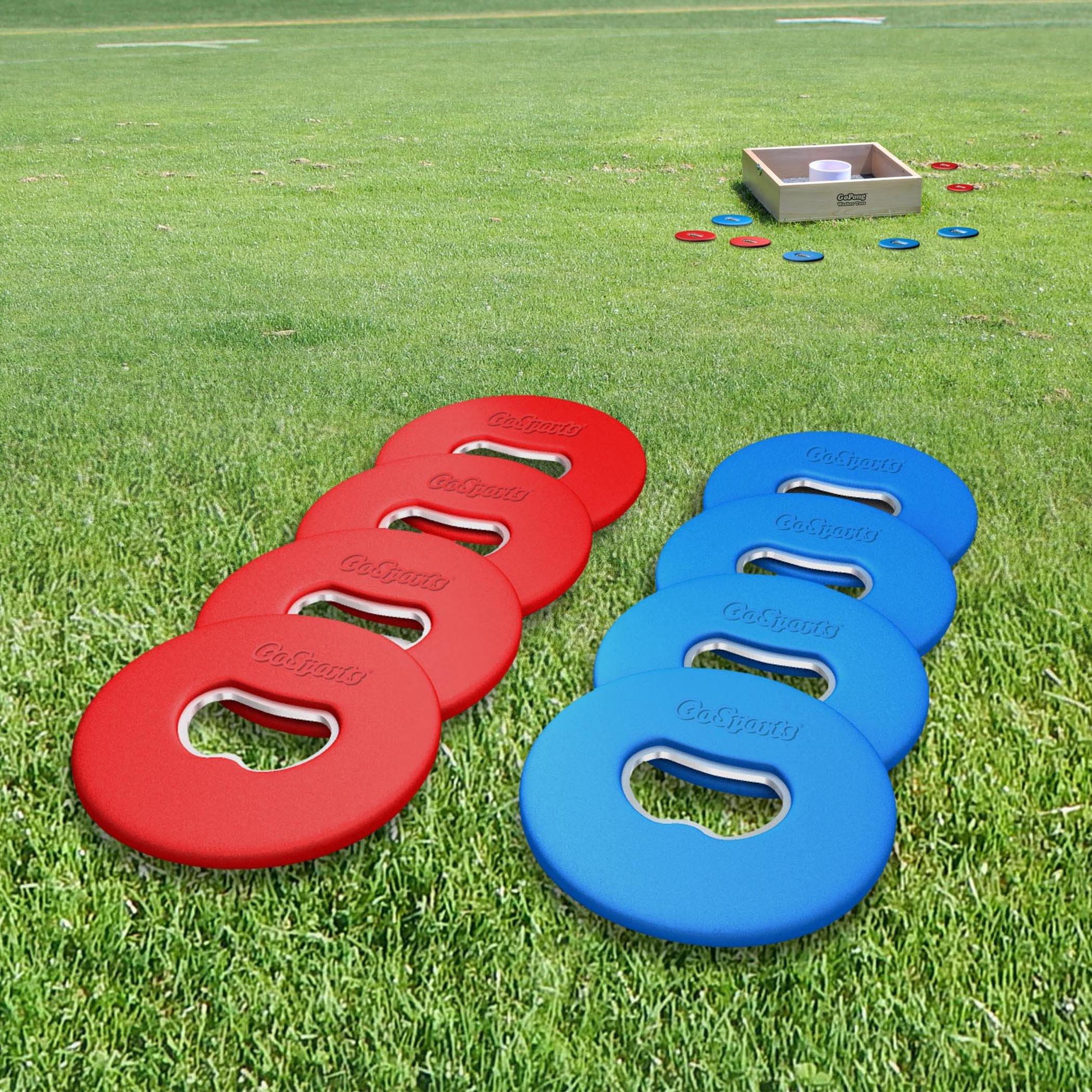 a set of three plastic bottle openers on the grass